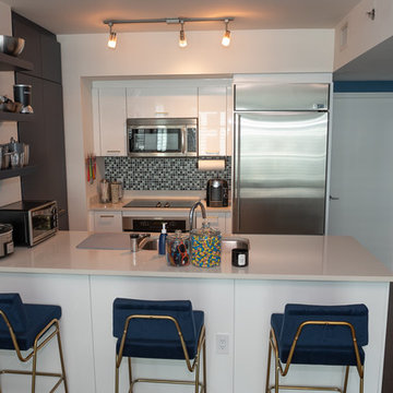 Modern Kitchen Remodel Done in White Gloss and Midnight Blue
