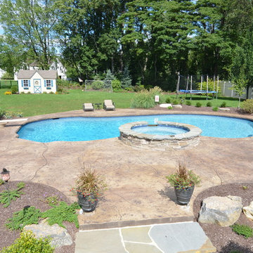 Midsize Pool with Spa and Traditional Diving Board