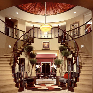 Elegant Pair of Circular Wooden Staircases with Iron Balusters
