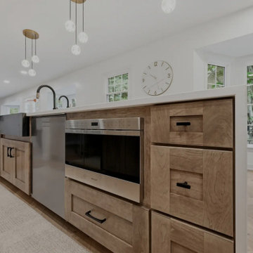 Warm Cherry Kitchen and Powder Room Remodel with Waterfall Island in Herndon, VA