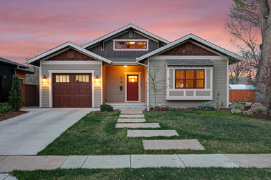 Mid-sized craftsman two-story mixed siding house exterior idea in Denver with a clipped gable roof and a shingle roof