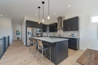 Example of a transitional kitchen design in Edmonton