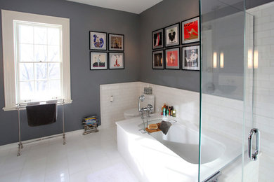 Large transitional master white tile and ceramic tile porcelain tile corner shower photo in New York with a vessel sink, shaker cabinets, white cabinets, quartz countertops, an undermount tub, a two-piece toilet and gray walls