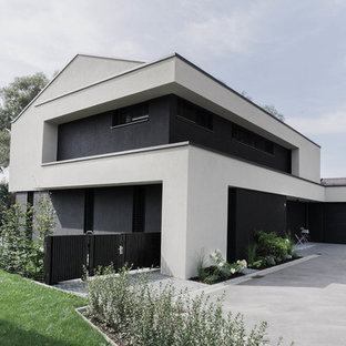 Großes, Zweistöckiges, Mehrfarbiges Modernes Einfamilienhaus mit Mix-Fassade in München