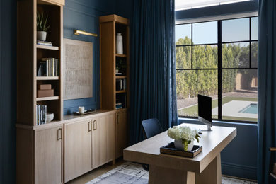 Inspiration for a small transitional freestanding desk light wood floor, wall paneling and beige floor study room remodel in Phoenix with blue walls
