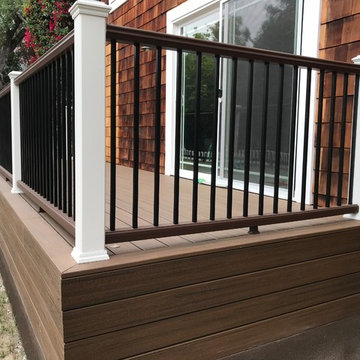 Deck Corner Post Detail With Black Metal Balusters