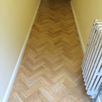Amtico Herringbone Design Installed to Floor in a Hallway