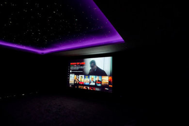 Inspiration for a modern home theater remodel
