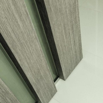 Brickell private condo - Custom columns wrapped with wood architectural film.