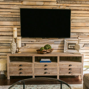 Inspiration for an industrial home theater remodel in Providence with a wall-mounted tv