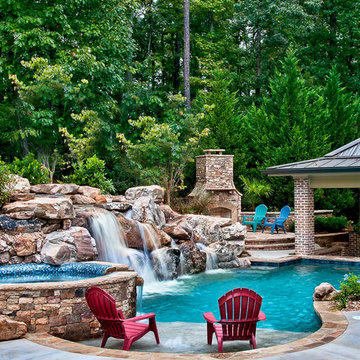Rustic Pool with Spa Waterfall & Swim Up Bar
