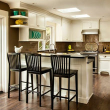 Rich dark subway tile backsplash