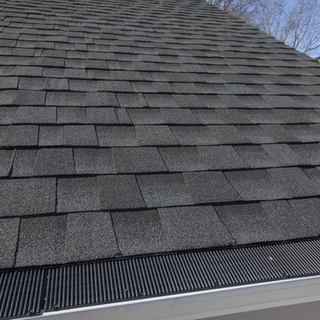 GAF HD Timberline Roofing shingles in Charcoal with Raindrop gutter guards
