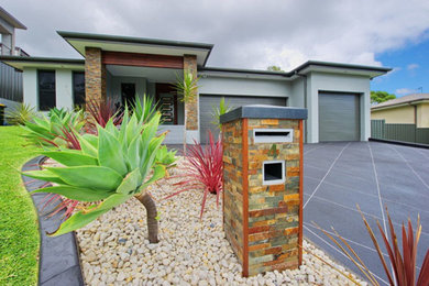 Design ideas for a modern home design in Newcastle - Maitland.