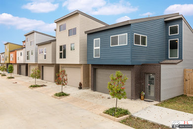 Example of a trendy home design design in New Orleans