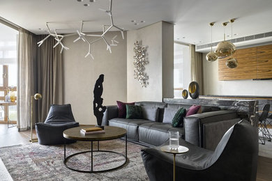 This is an example of a large contemporary living room in Moscow with beige walls, dark hardwood floors and brown floor.