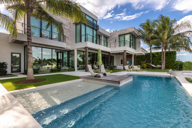 Home design - large contemporary home design idea in Miami