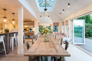 Design ideas for a large beach style dining room in Sussex.