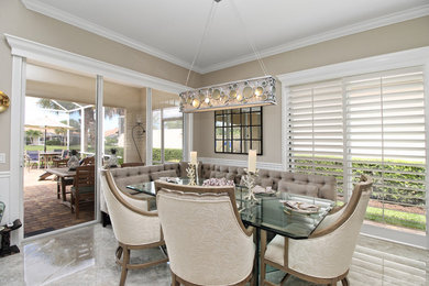 Dining room - coastal dining room idea in Miami