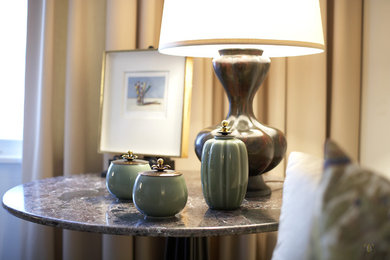 Example of a transitional living room design in New York