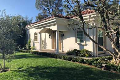 Example of a tuscan home design design in Los Angeles
