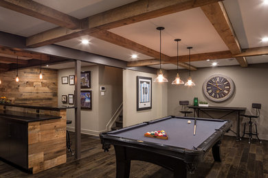 Photo of a contemporary basement in Ottawa with dark hardwood floors and brown floor.