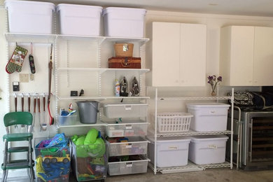 Example of a mid-sized classic attached garage design in Dallas