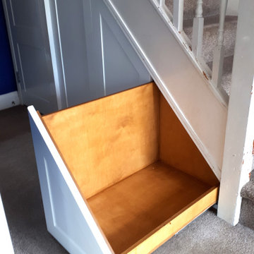 Understairs pull out storage and replacement door.