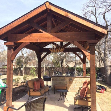 Patio Cover with small boots and collars around posts, including sone bar