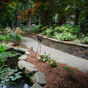 Elegant stone wall and pond