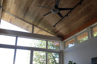 Inspiration for a small scandinavian open concept dark wood floor living room remodel in Toronto