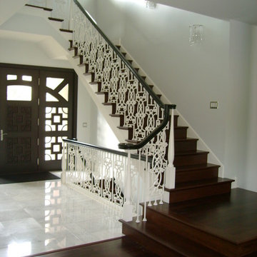 Staircase with decorative metal balusters