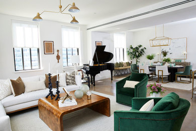 Inspiration for a large modern brown floor living room remodel in New York with white walls