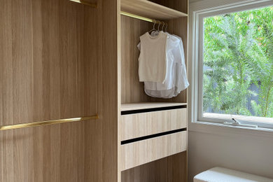 This is an example of a contemporary storage and wardrobe in Melbourne.