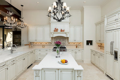 Inspiration for a traditional u-shaped open plan kitchen in Miami.
