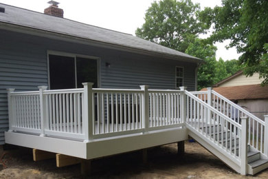 Mid-sized arts and crafts backyard deck photo in DC Metro with no cover