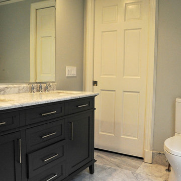 Modern Bathroom with Double Vanity and Sleek Toilet Design