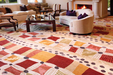 Inspiration for a huge contemporary formal and open concept carpeted living room remodel in Toronto with beige walls, a standard fireplace, a stone fireplace and no tv