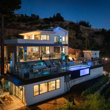 A little farm below a hillside resort-style off-the-grid view home