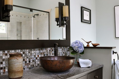 Alcove shower - mid-sized contemporary master mosaic tile and gray tile porcelain tile and gray floor alcove shower idea in Other with soapstone countertops, a vessel sink, flat-panel cabinets, brown cabinets, a one-piece toilet, blue walls, a hinged shower door and gray countertops