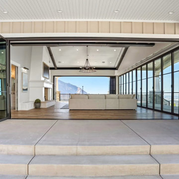 Outward-Stacking Folding Glass Doors Open the Pavilion Fully to the Pool Deck