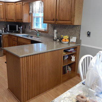 Peninsula with storage on both sides and bead board