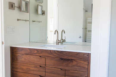 Alcove shower - mid-sized modern master white tile and ceramic tile ceramic tile alcove shower idea in Boston with flat-panel cabinets, medium tone wood cabinets, white walls and an undermount sink