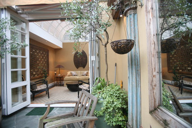 This is an example of an eclectic conservatory in London.