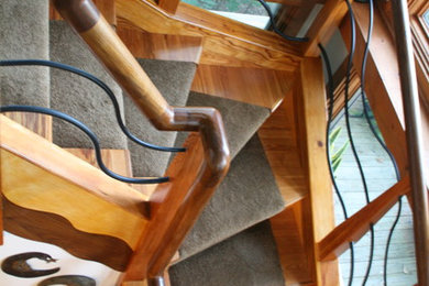 Example of an eclectic staircase design in Raleigh