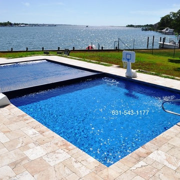 Waterfront backyard, swimming pools & masonry