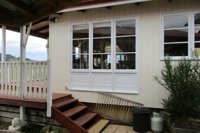 Photo of a traditional home design in Hobart.
