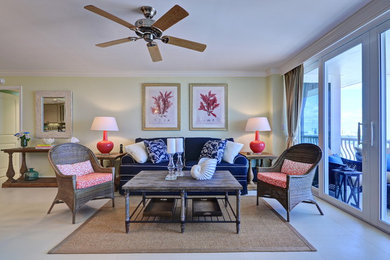 Small beach style open concept porcelain tile living room photo in Miami with beige walls and a wall-mounted tv