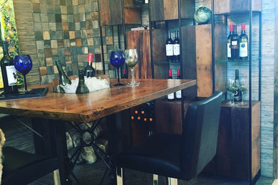 Inspiration for a transitional home bar remodel in Edmonton