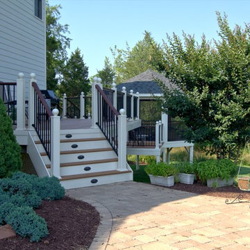 A Multilevel Outdoor Oasis featuring Timbertech Decking and Screened In Gazebo